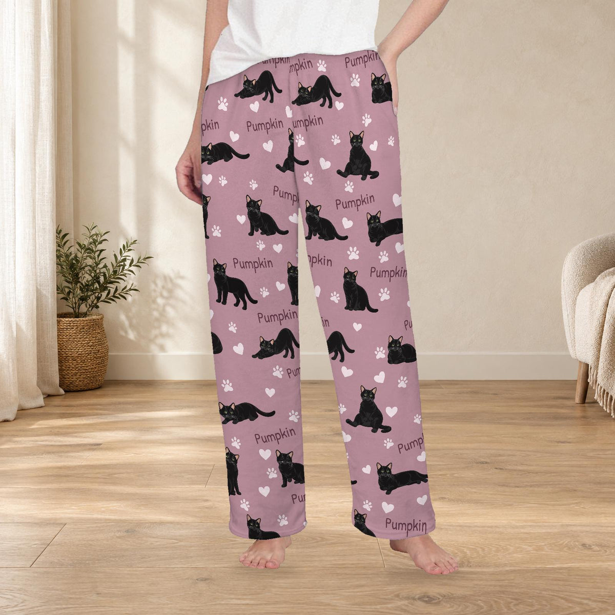 Domestic Shorthair personalized fleece pajama trousers on a model; women's fit, front view. Cozy neutral room background.