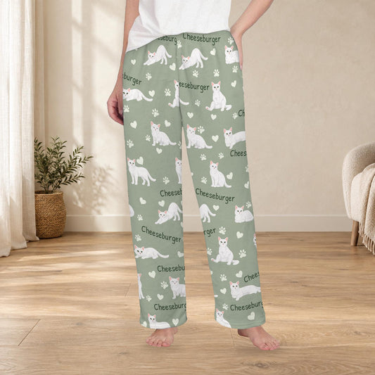 Domestic Shorthair personalized fleece pajama trousers on a model; women's fit, front view. Cozy neutral room background.