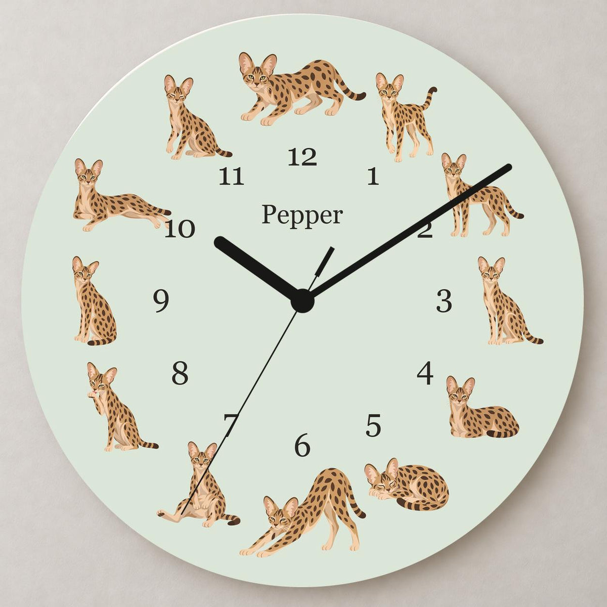 Personalized Savannah Cat wooden wall clock with example name Pepper; close up