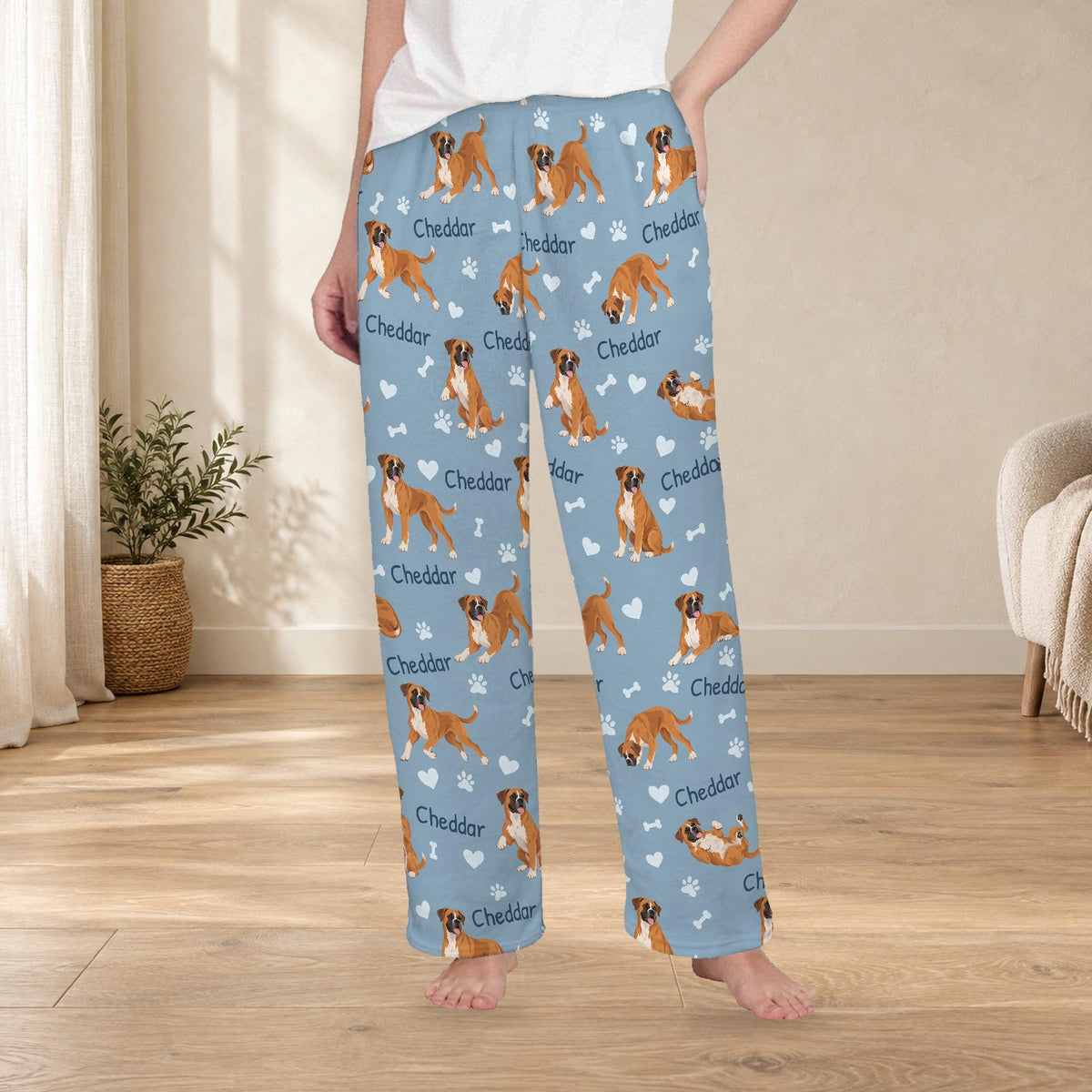 Boxer personalized fleece pajama trousers on a model; women's fit, front view. Cozy neutral room background.