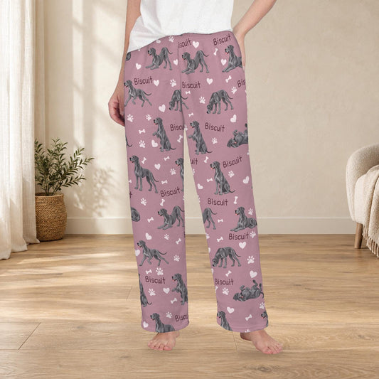 Great Dane personalized fleece pajama trousers on a model; women's fit, front view. Cozy neutral room background.