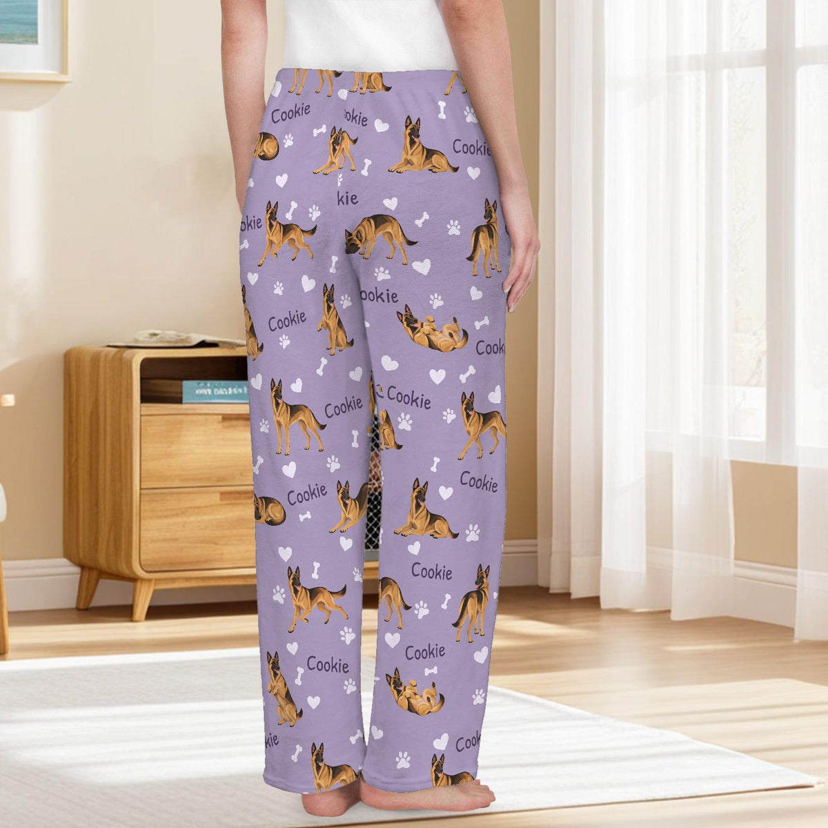 Belgian Malinois personalized pet name fleece pajama trousers, back lifestyle view.