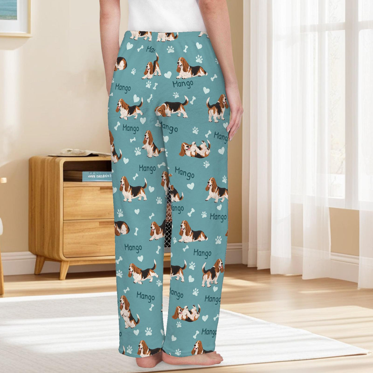 Basset Hound personalized pet name fleece pajama trousers, back lifestyle view.