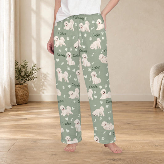 Bichon Frise personalized fleece pajama trousers on a model; women's fit, front view. Cozy neutral room background.