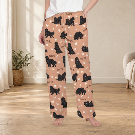 Newfoundland personalized fleece pajama trousers on a model; women's fit, front view. Cozy neutral room background.