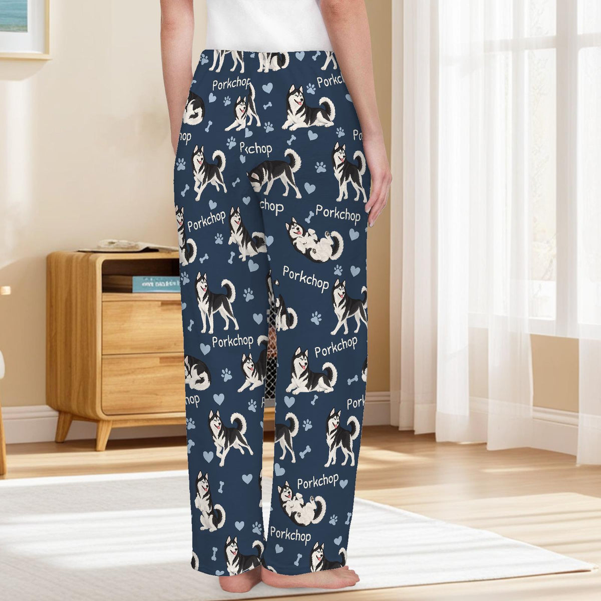 Siberian Husky Black and White personalized pet name fleece pajama trousers, back lifestyle view.