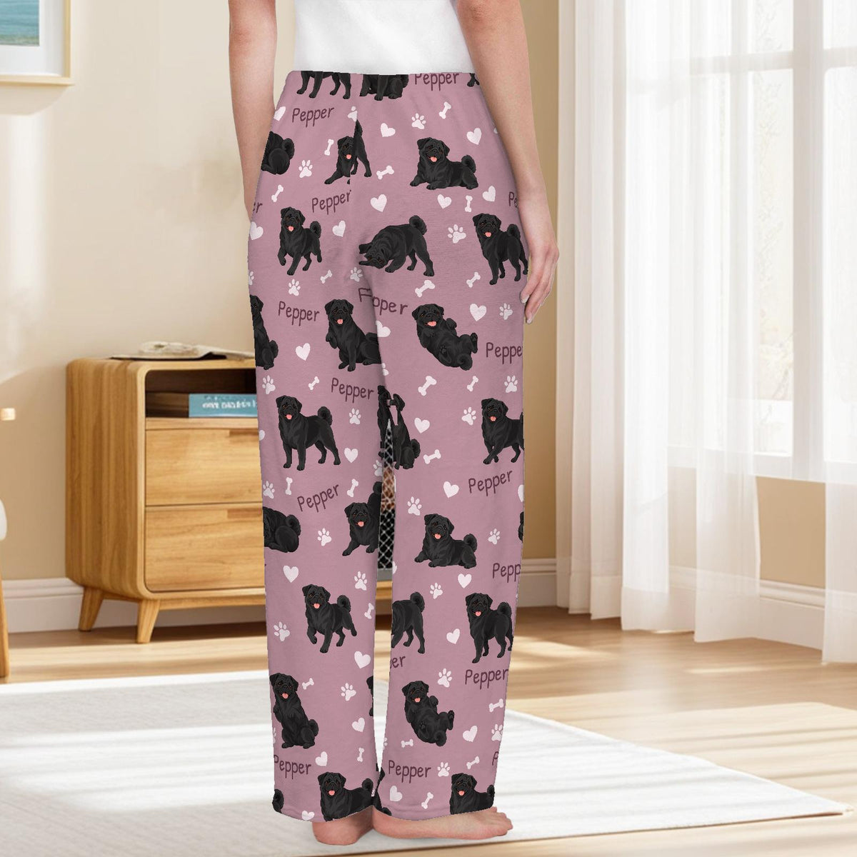 Pug Black personalized pet name fleece pajama trousers, back lifestyle view.
