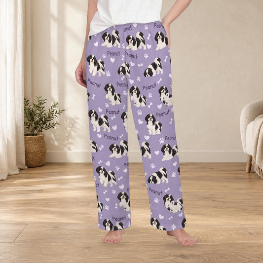 Shih Tzu Black and White personalized fleece pajama trousers on a model; women's fit, front view. Cozy neutral room background.