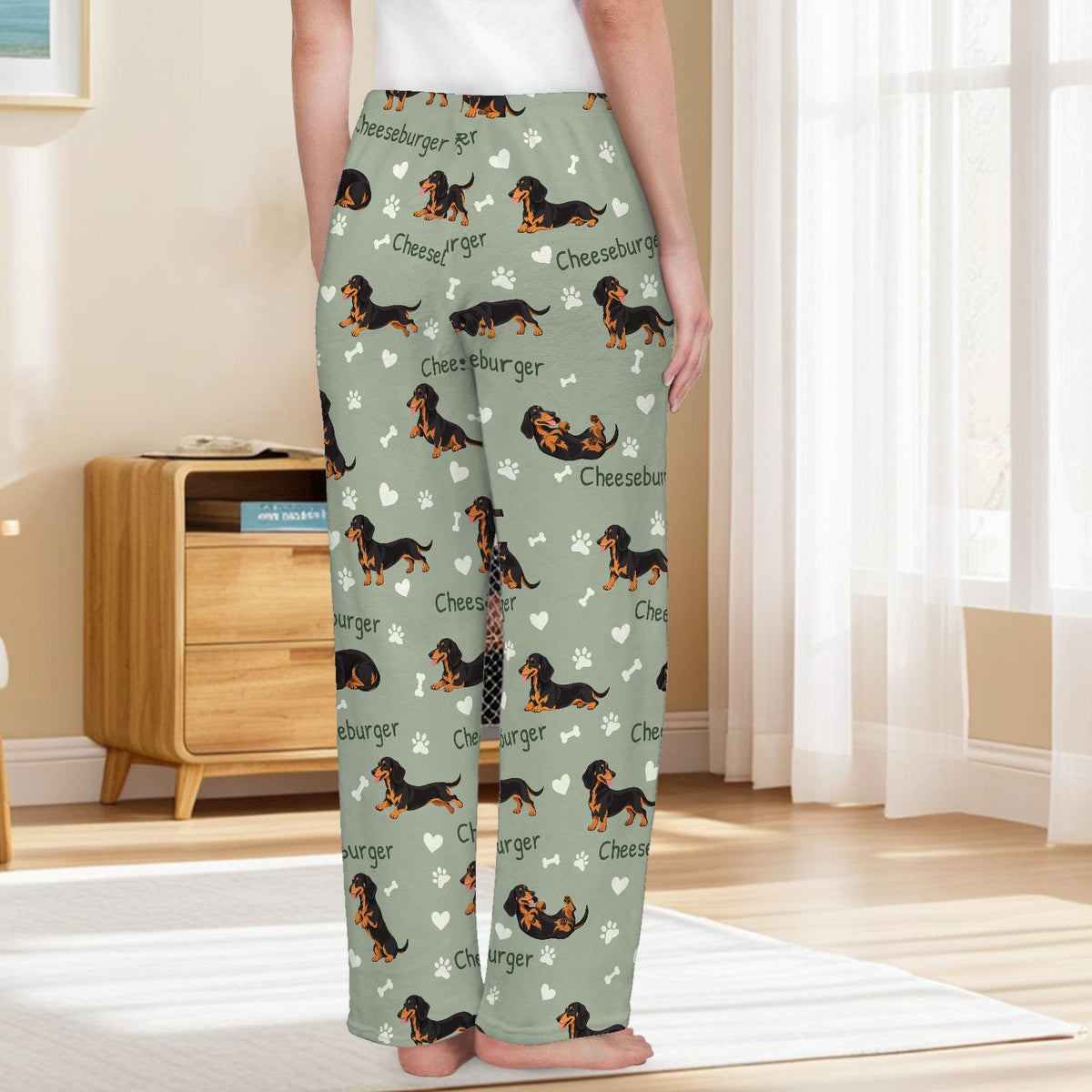 Dachshund Black and Tan personalized pet name fleece pajama trousers, back lifestyle view.