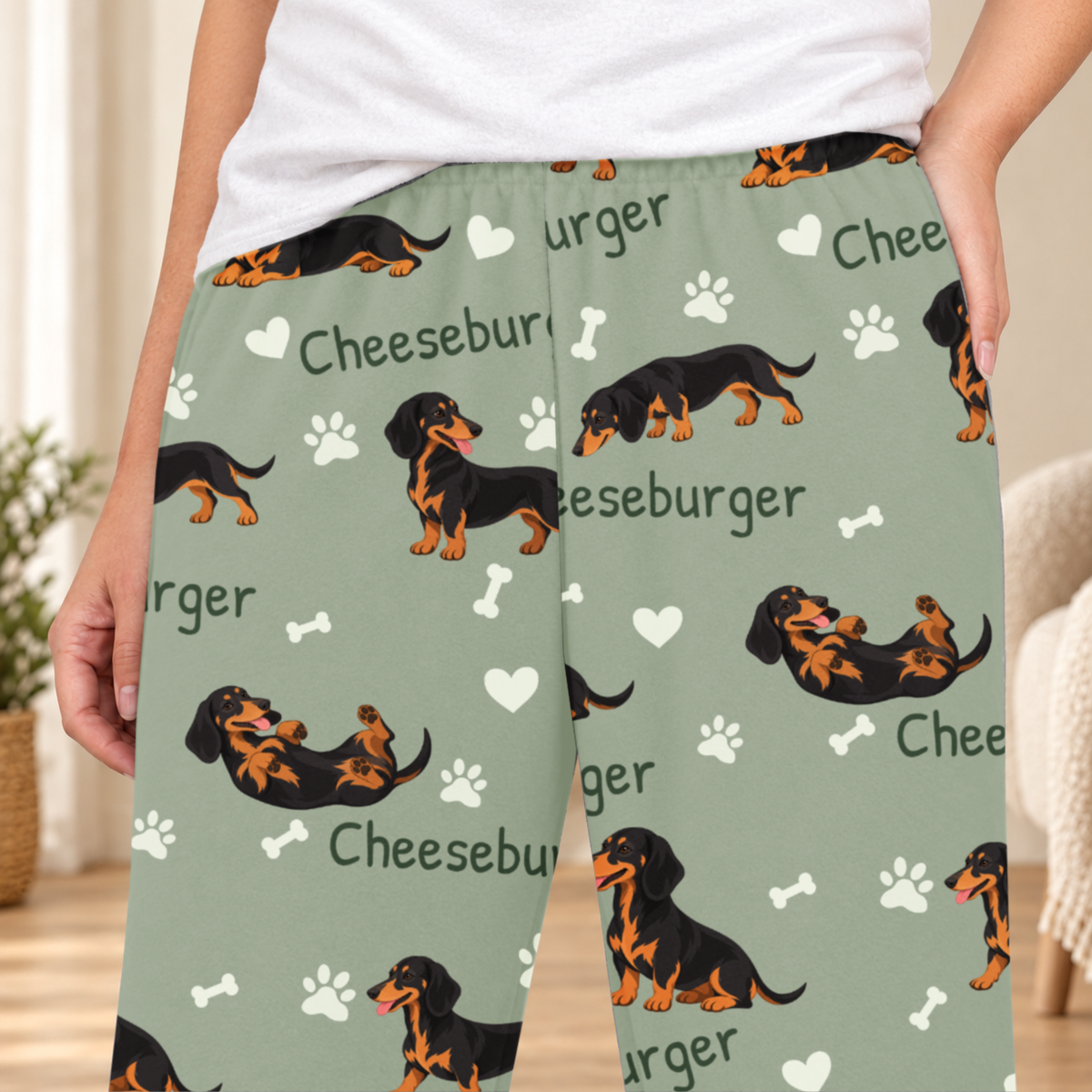 Dachshund Black and Tan personalized fleece pajama close-up showing breed artwork and example pet name